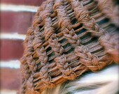 Hand knit hat in gold shimmer ribbon under 25