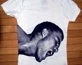 White tee with red or black silkscreen image on the front and back SIZE MEDIUM