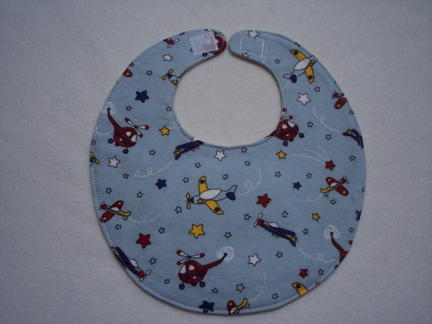 Baby Bibs, four soft layers, reversible, blue with red & yellow airplanes