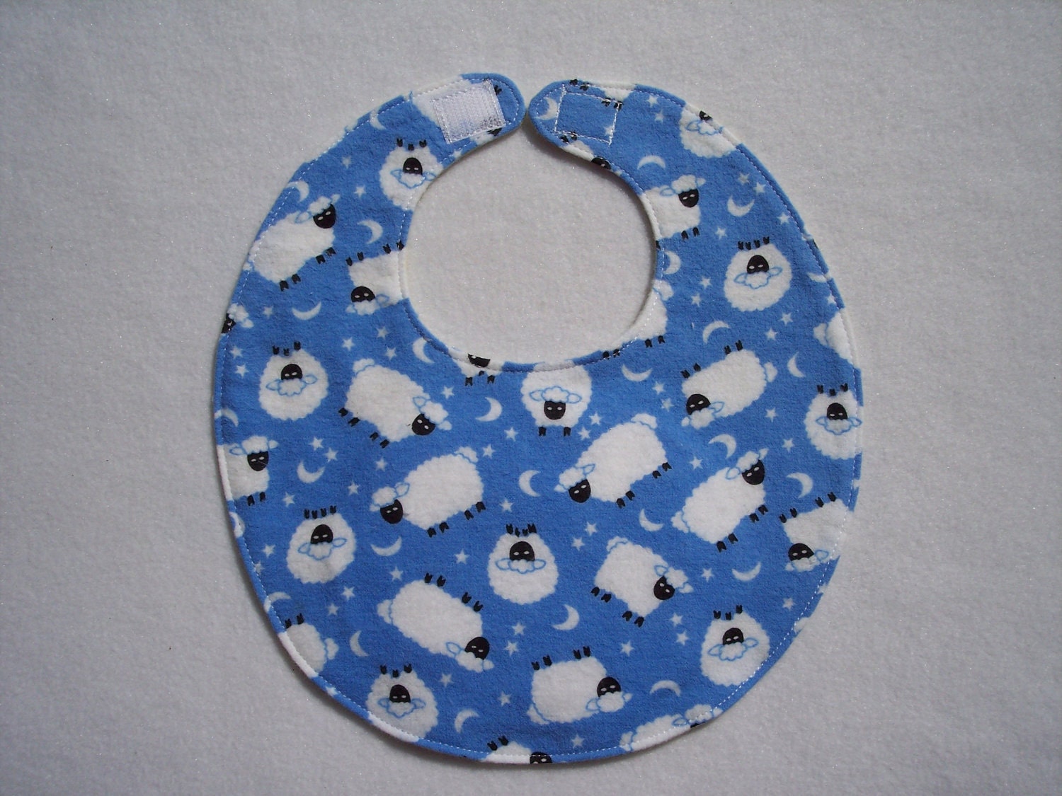 Baby Bibs, four soft layers, reversible, blue with white lambs