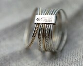 9 Candy twists silver and 14kt yellow gold stacking rings