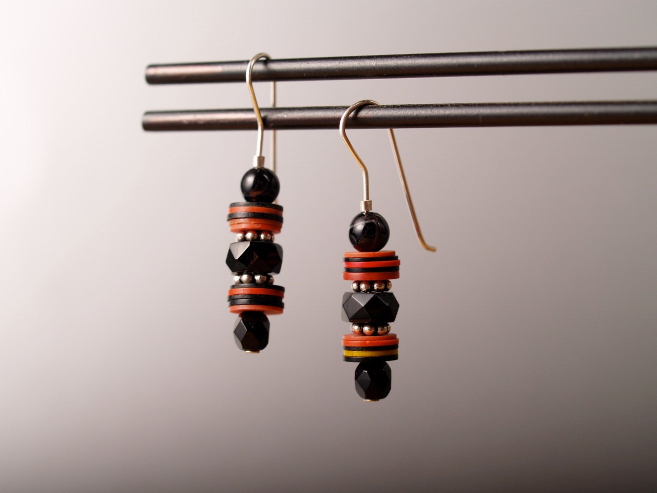 Earrings of African heishi, Czech glass, and onyx