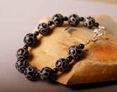 Treasure bracelet of Jet Carved serpentine and onyx
