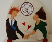 Holding the Hands of Time - a portrait clock for happy couples