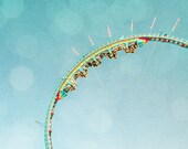 carnival ride,county fair,fairground,bokeh lights against baby blue sky,pastel colors,circus inspired artwork,geometric,half circle line