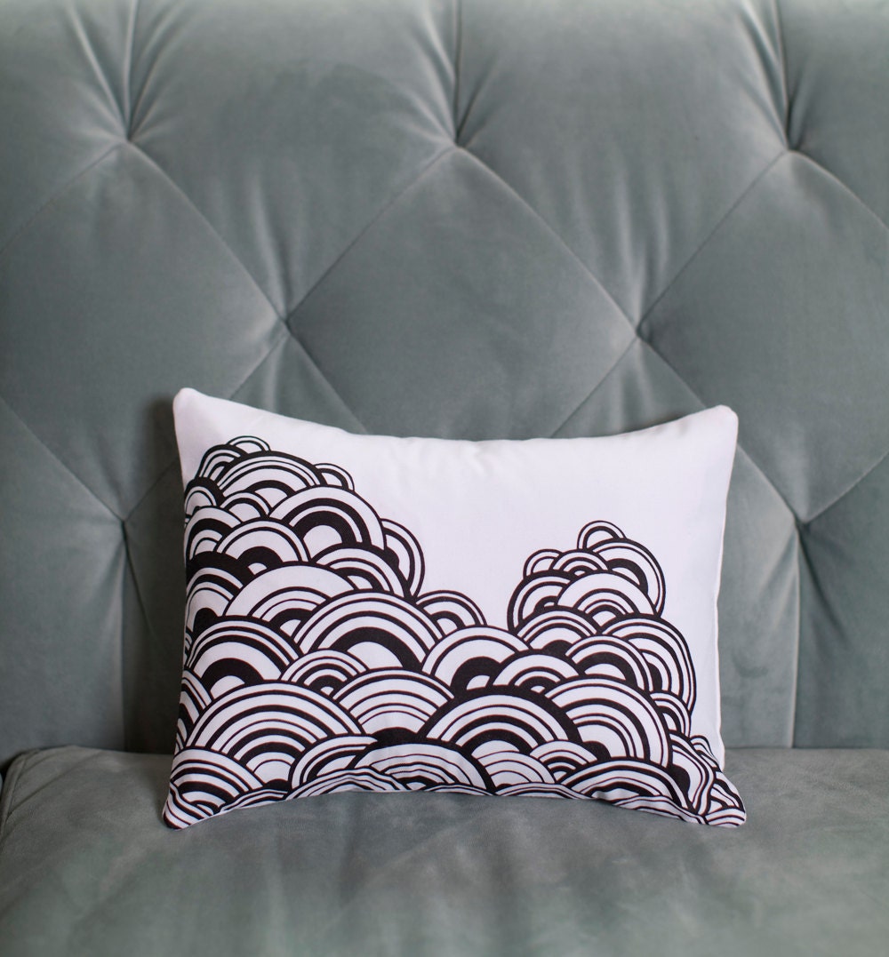 menacing clouds . organic pillow . 10 x 13