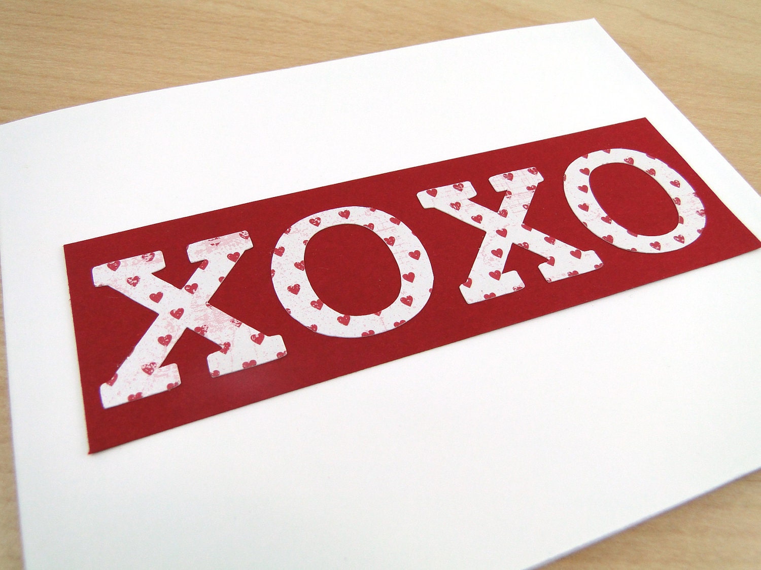 Valentine Hugs and Kisses greeting card in red