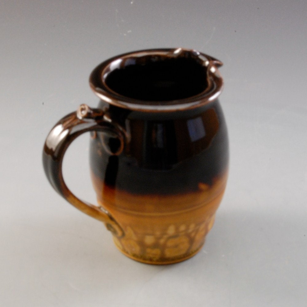 Pitcher, small ebony brown and golden brown