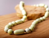 Pale mint magnesite necklace with iolite