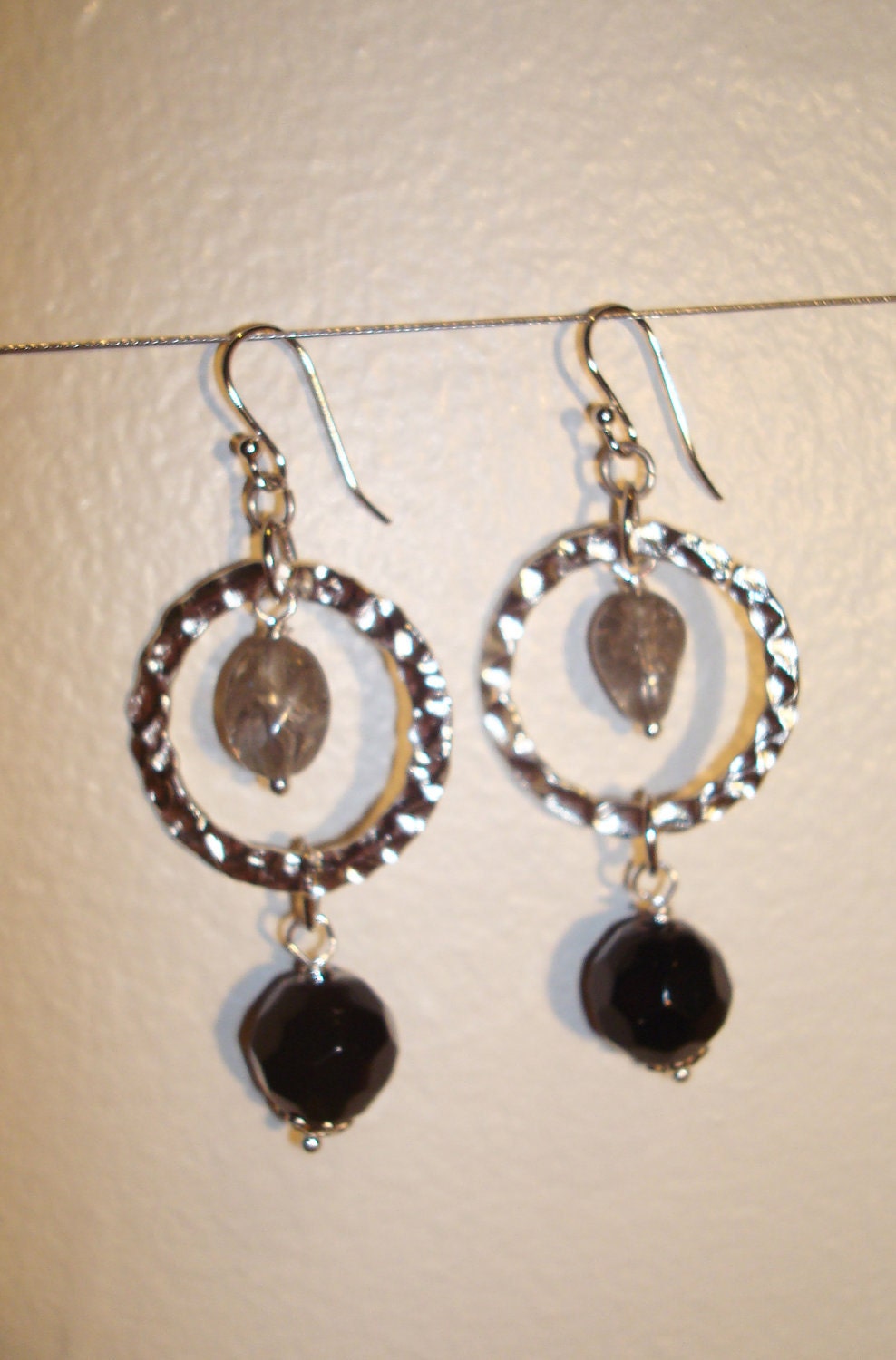 Silver hoops and black and gray beads