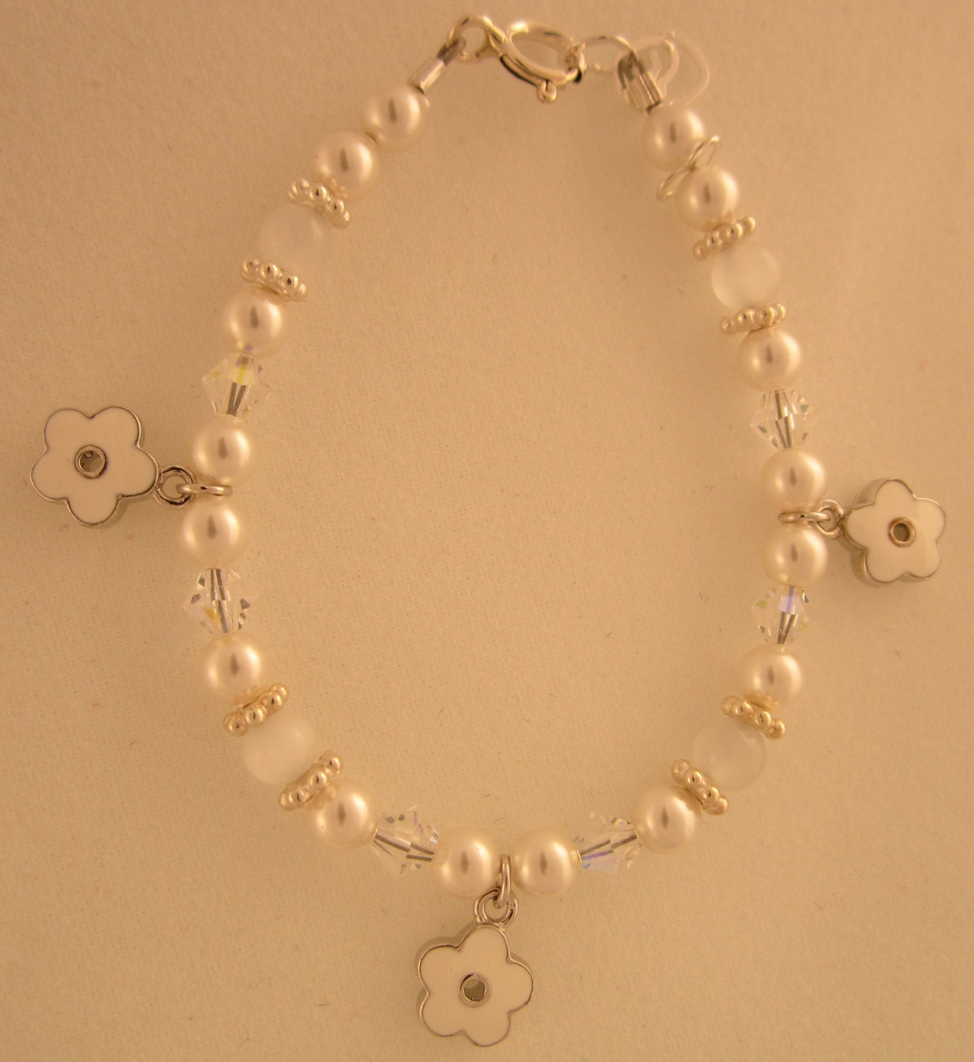 White Enamel Flowers baby bracelet (BEFW)