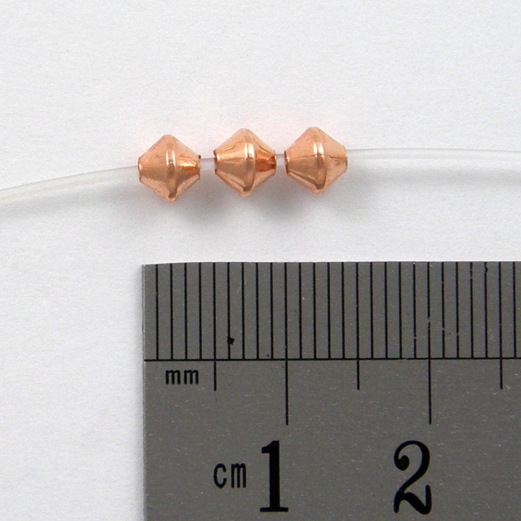100 - 4.8mm BICONE Bead Bright COPPER