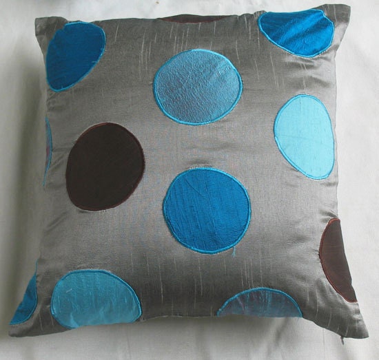 silver gray throw pillow cover w/  appliqued circles in shades of blue and brown