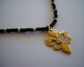 Black and Gold Fleur de Lis Stretch Necklace