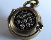 skull mourning locket  steampunk SKULL MOSAIC LOCKET bronze with sterling silver skulls