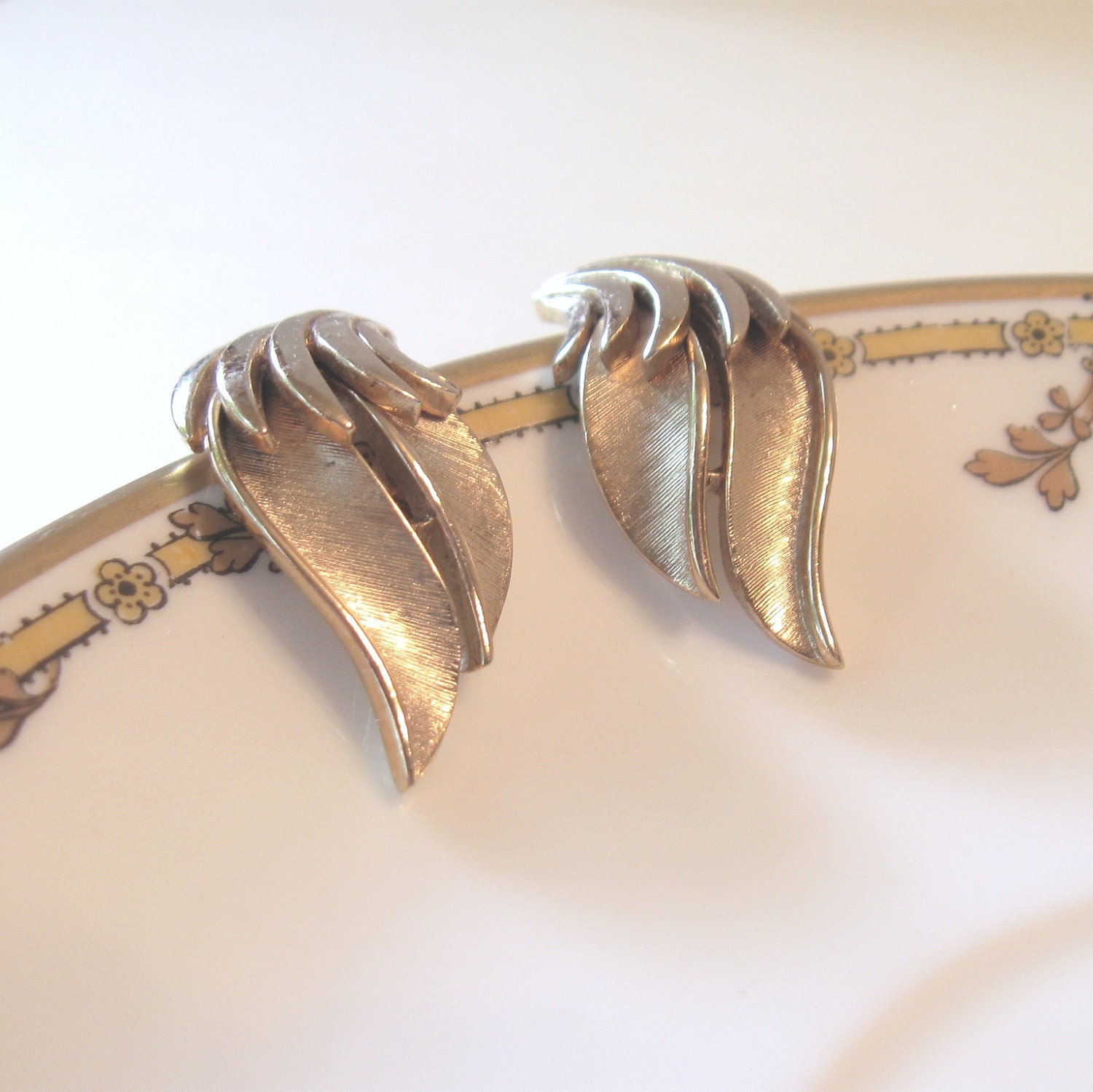 Vintage Crown Trifari Leaf Earrings with Shiny Gold Tone, Brushed Gold Tone