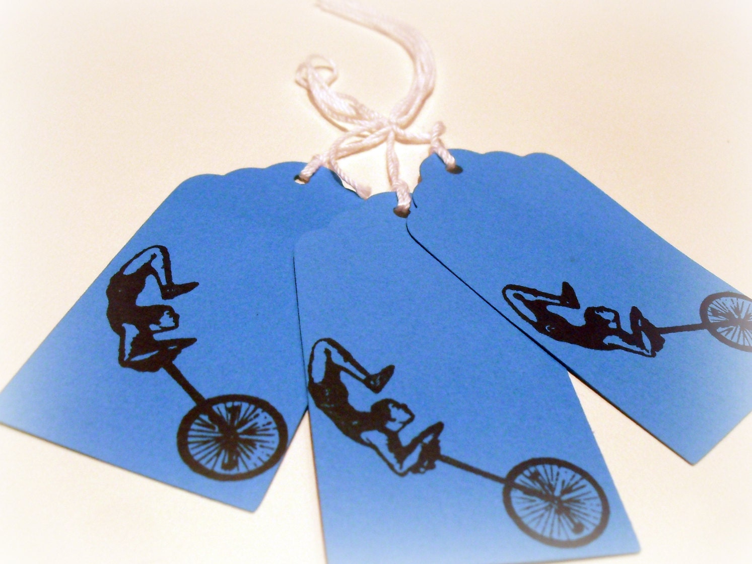 3 Large Blue Unicyclist Tags