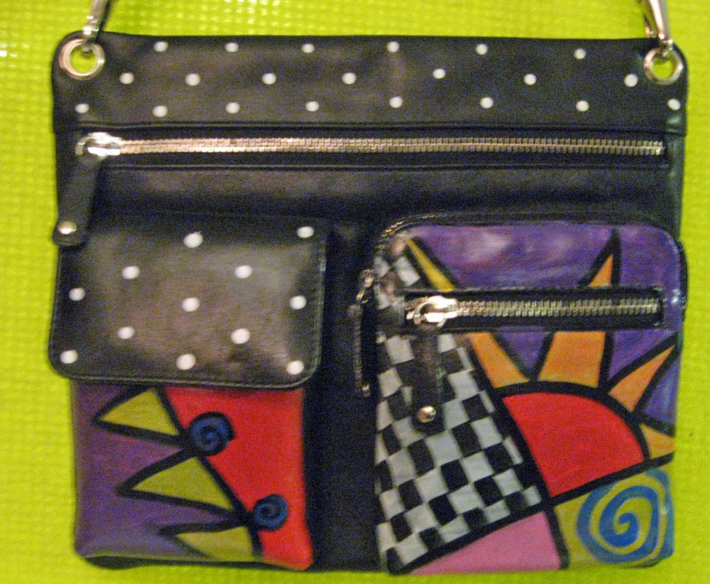 Hand painted purse with adjustable strap pockets zippers