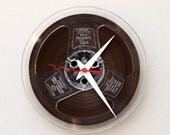 Clock made from a recycled magnetic tape reel