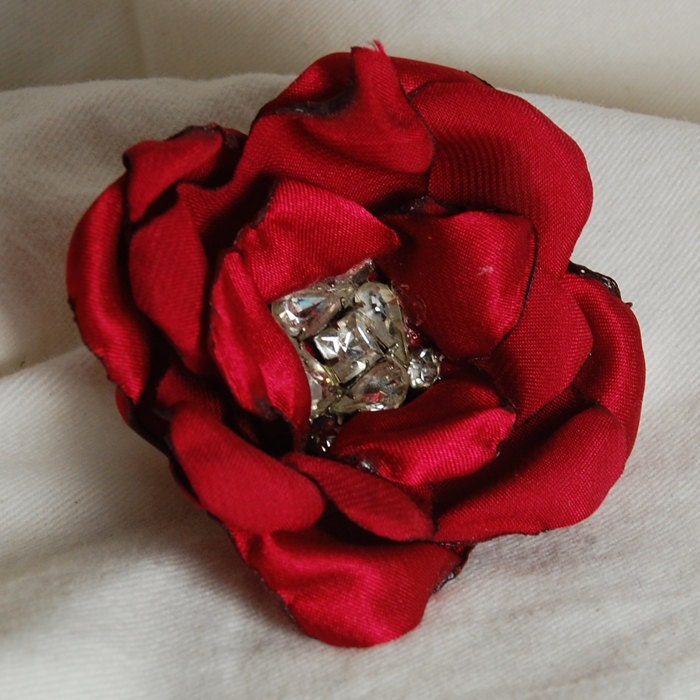 Handmade recycled red satin & vintage rhinestone center. perfect for holiday hair accessory. you choose attachment