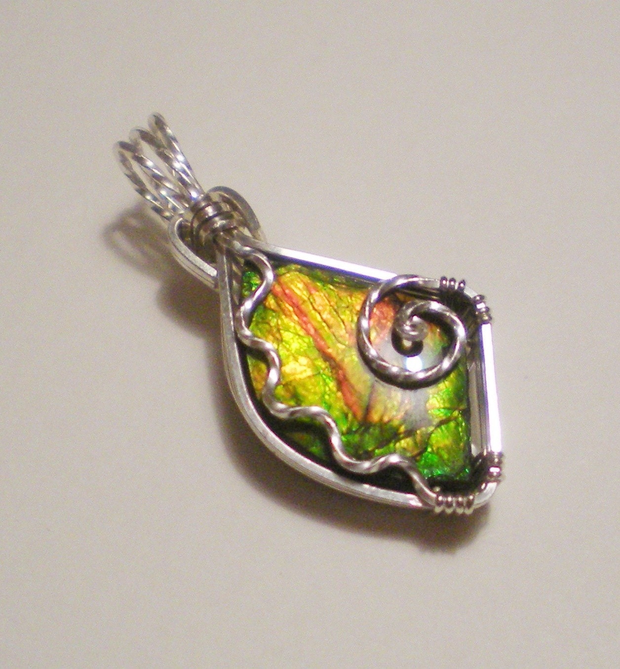 AMMOLITE sterling silver wire wrapped pendant
