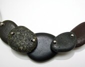 Riveted Ocean Stones with handmade silver chain.