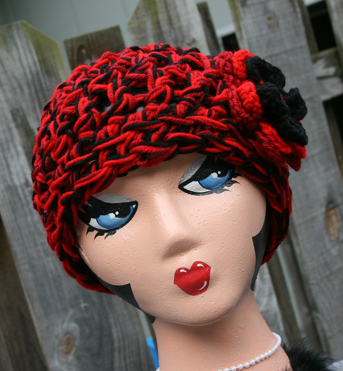Cloche hat crochet flower and button accent hat in beautiful fashion colors of red, burgundy, and black.