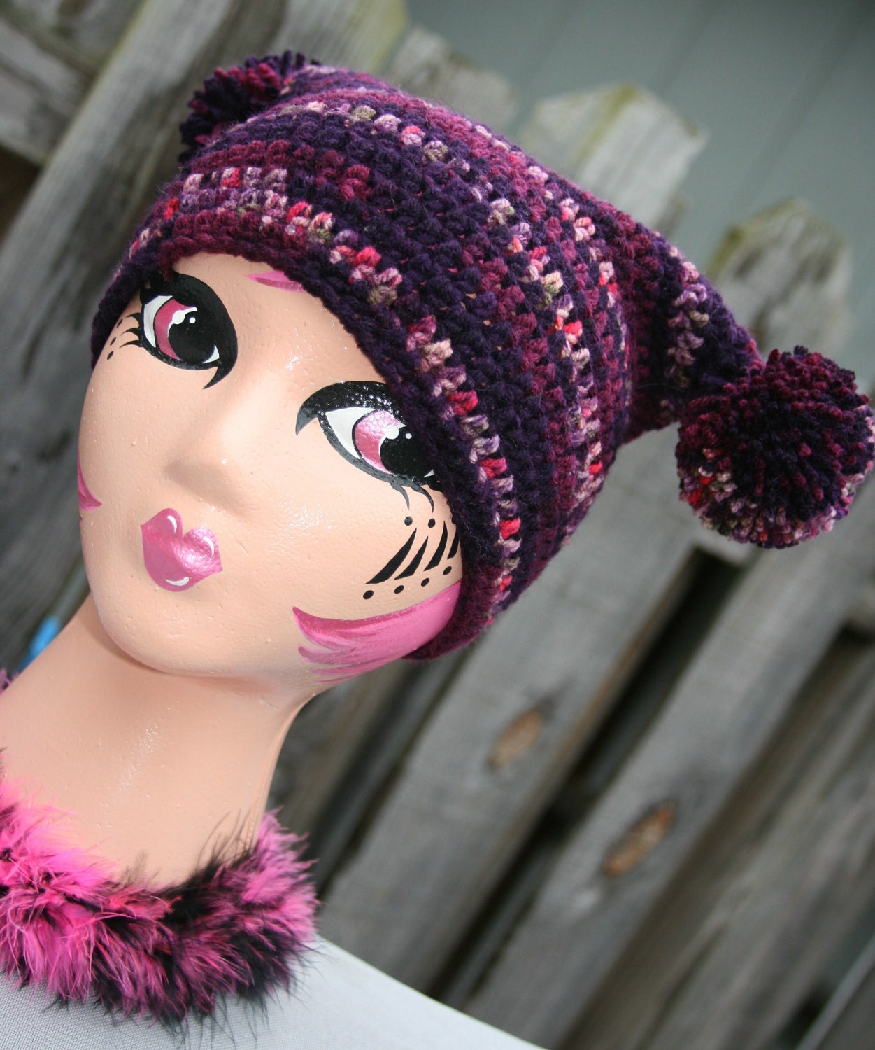 Purple Hat crochet girls jester with poms. Purple varigated with pink and black soft yarn. Only one available
