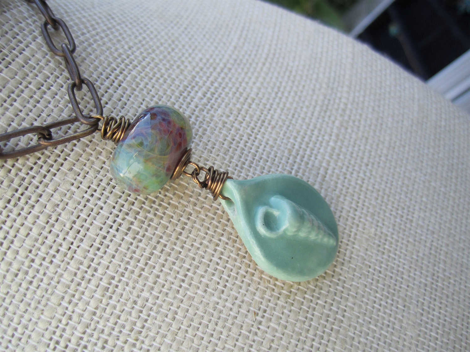 Beachy boro and ceramic pendant style necklace, Vintaj Natural Brass