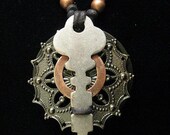 urban artifact necklace with vintage key, gunmetal filigree stamping, copper washer, retaining ring, copper beads