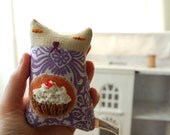 A small ornamental kitten called Cherry