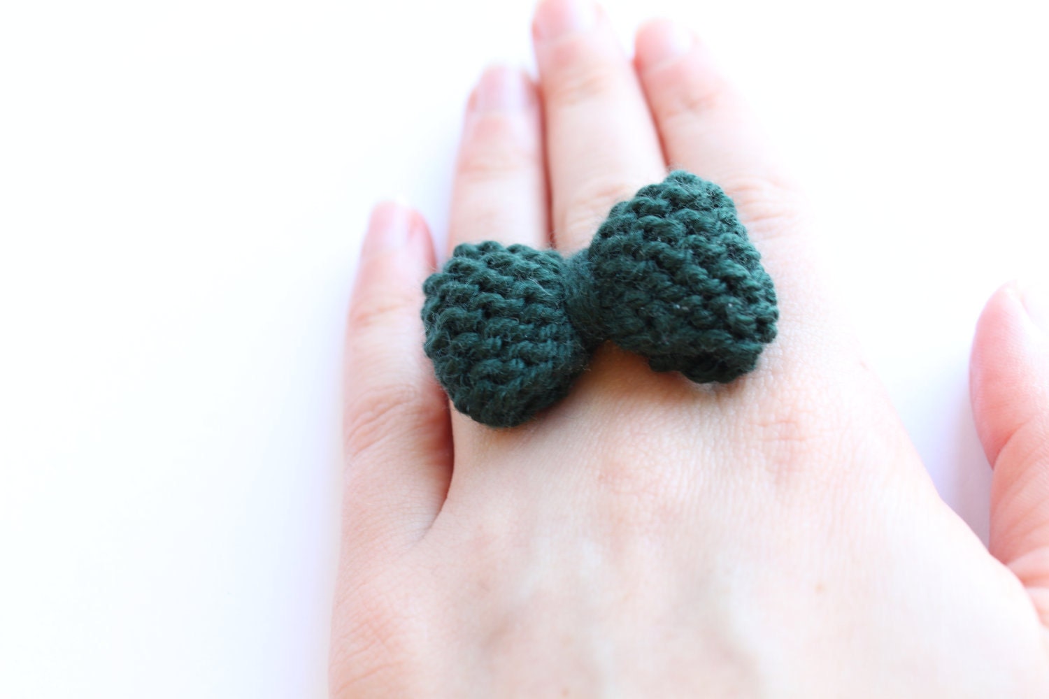 Bow ring knitted in forest green: READY TO SHIP