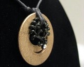 urban artifact necklace - bronze washers, black jewelry component with aurora rhinestone