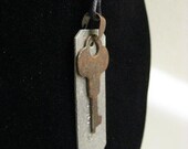 urban artifact necklace - rusty vintage key, found object aluminum conduit marker tag, copper jewelry bail