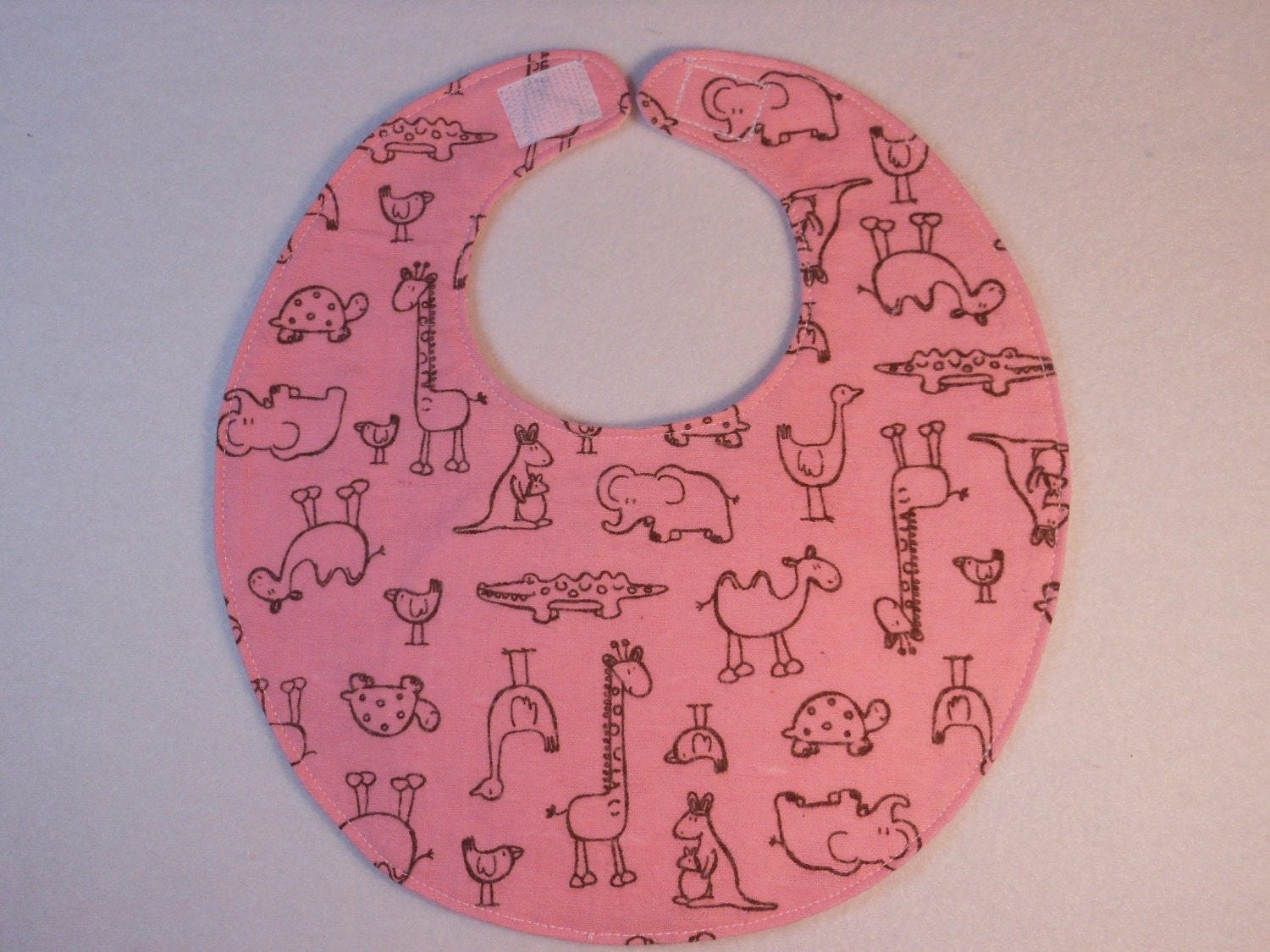 Baby Bibs, four soft layers, reversible, pink with the cutest critters