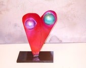 Red violet steel heart sculpture