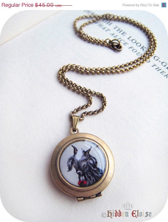 VALENTINES SALE -- Delicate Round Art Locket  -One black baby goat-  A08