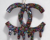 Multi-colored glitter bleeding Chanel logo necklace