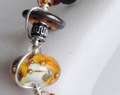 Topaz Pizazz OOAK Artisan Lampwork Honey Topaz And Black Sterling Silver Bracelet