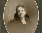 Studio portrait beautiful woman antique photo
