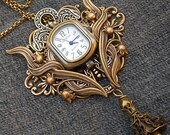 Steampunk watch necklace or brooch