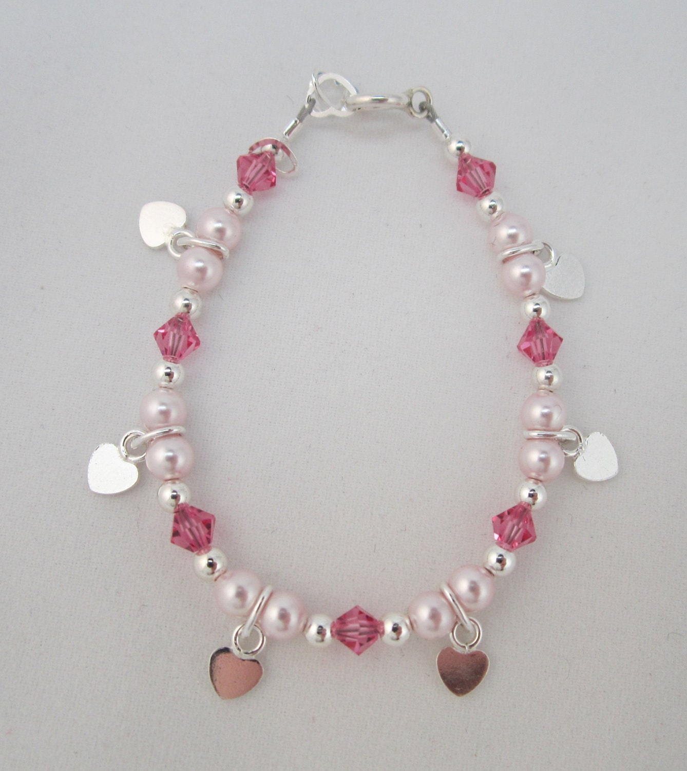 Pink Pearls and red Crystals with hanging flat hearts baby bracelet (BSH)
