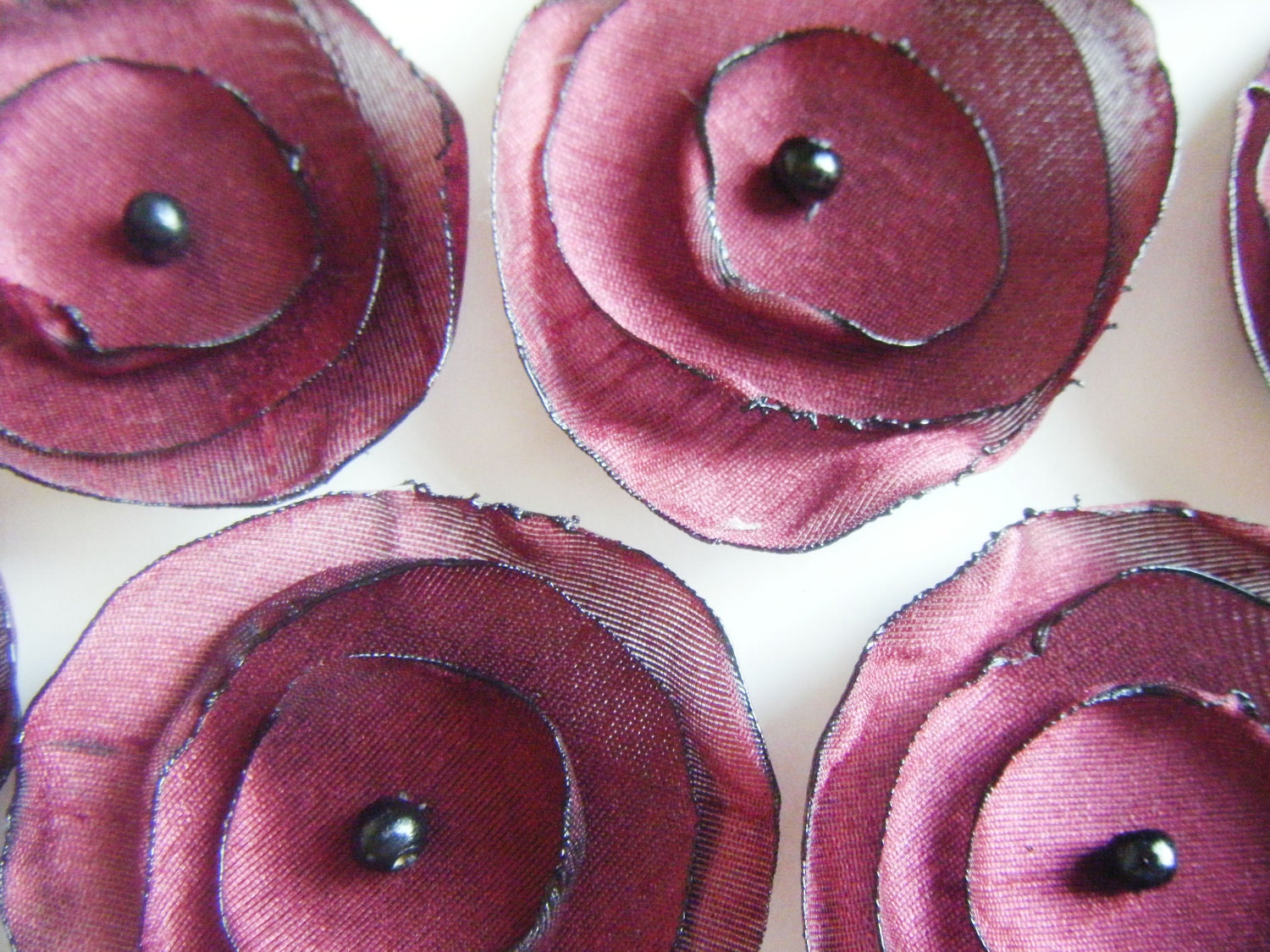 Crimson wine red silk fabric flowers for scattering on your wedding reception tables x 10