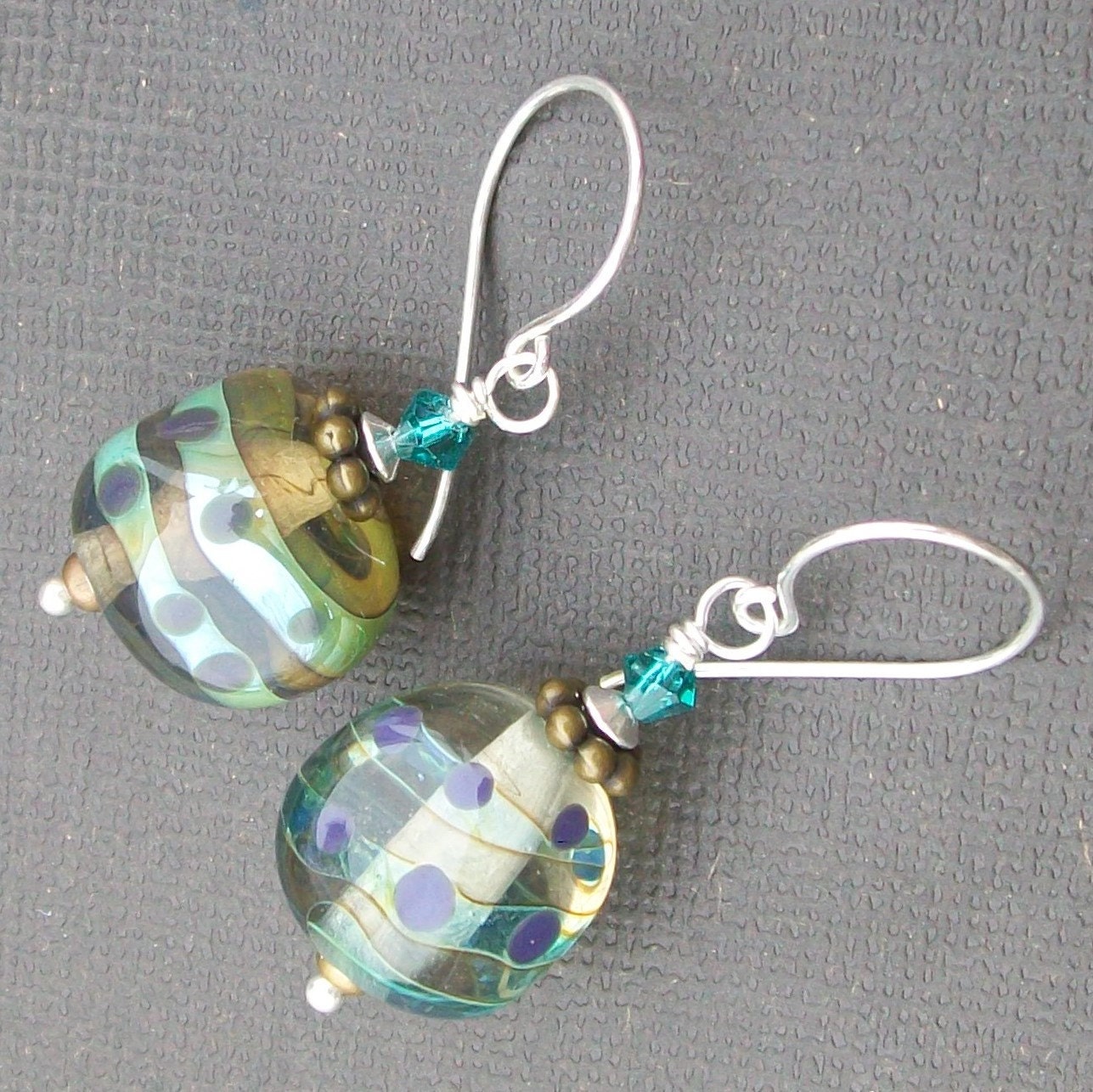 lampwork earrings clear glass with aqua stripe and blue spotted beads- wrapture