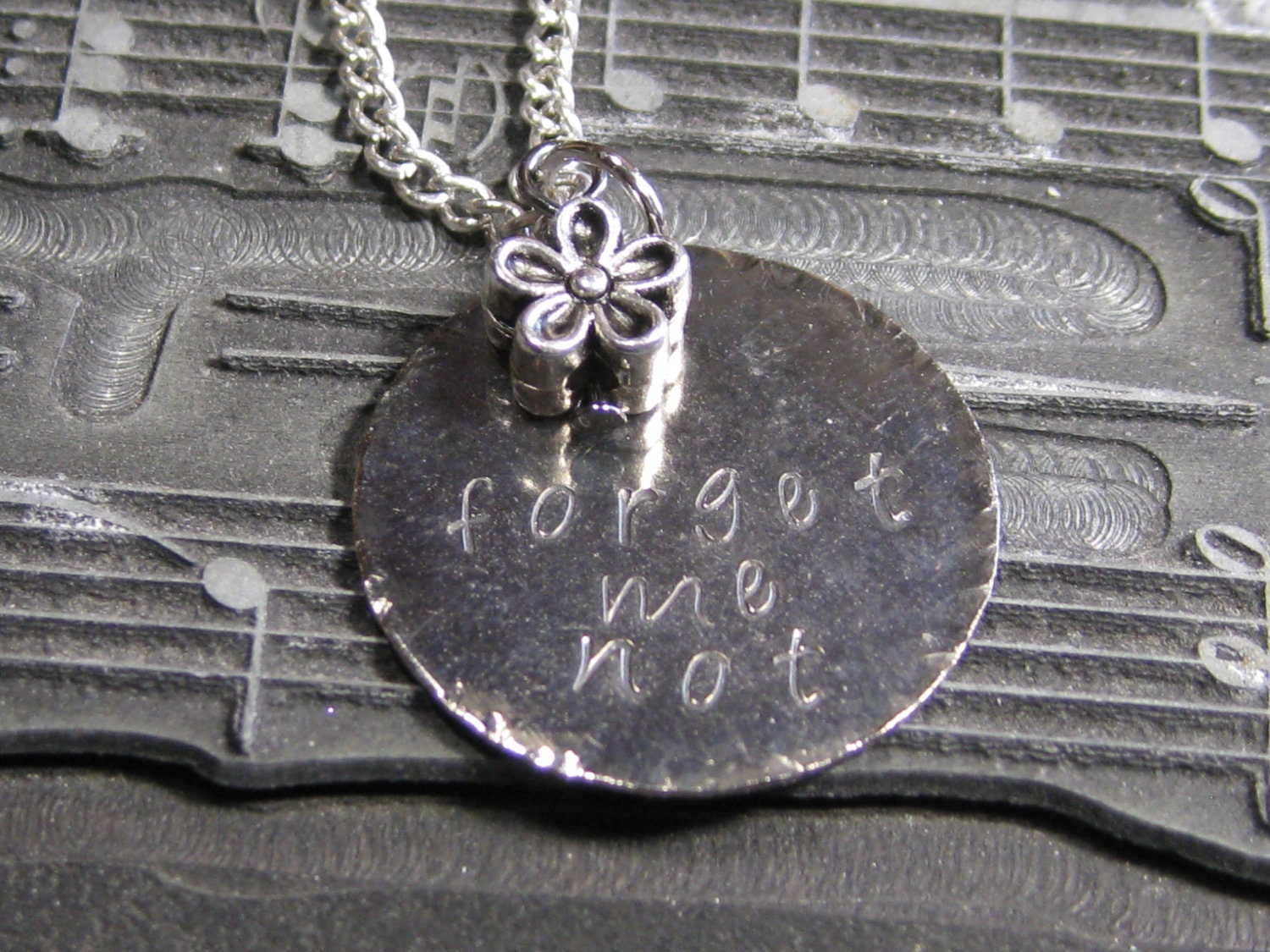 Silver Handstamped Metal forget me not pendant