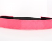 Band-It Headband .... Solid Bright Pink.  Will stay put and not slip.