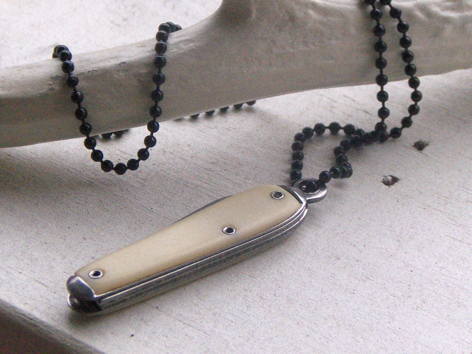 The Hitchhiker . Vintage Celluloid Advertisement Pocket Knife necklace. Unisex talisman