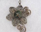 Wrapped Flower Pendant Green Glass Cabochon