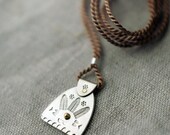 Mystic Orient Amulet necklace on silk cord