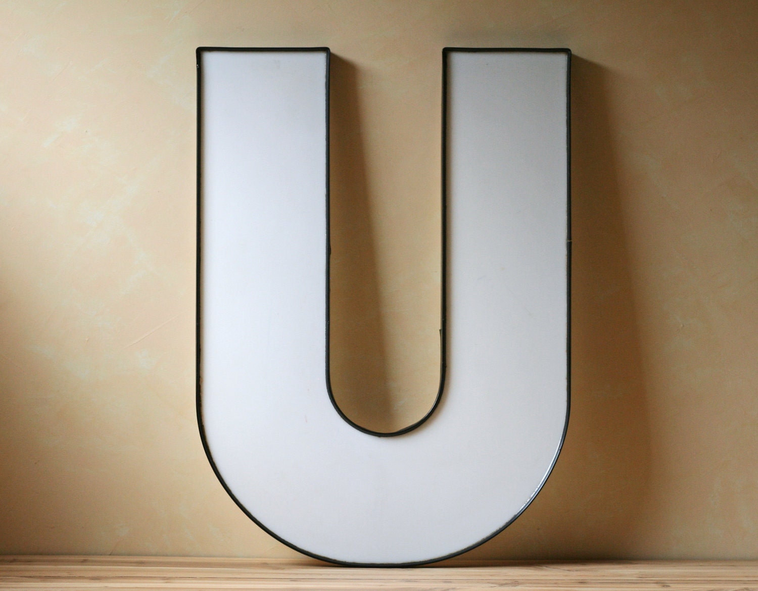 large vintage white letter U